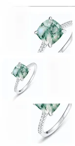 Macro shot of S925 silver ring featuring square green moss agate and side diamonds