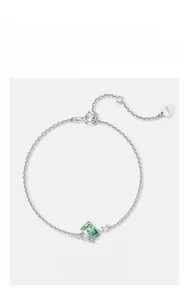Detail view of S925 silver bracelet with green moss agate and star-shaped accents