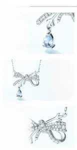 Detailed macro view of S925 silver bow necklace with pavé diamonds and topaz pendant