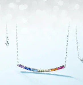 Detail of S925 sterling silver necklace featuring a rainbow gradient of round cubic zirconia