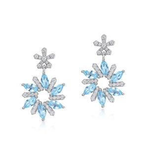 Elegant S925 silver snowflake earrings with sparkling blue gemstones on white background