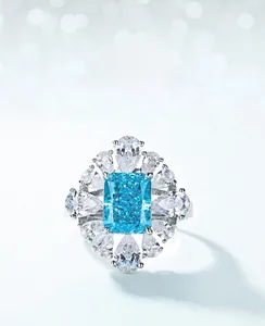 Macro detail of aquamarine high carbon diamond ring in S925 silver with floral setting
