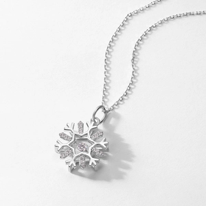 Sparkling S925 silver snowflake pendant necklace featuring a shimmering dancing center stone