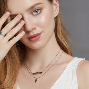 Double-layered S925 silver necklace with geometric green moss agate pendants on model