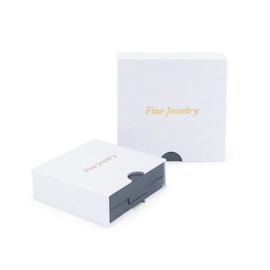 White drawer jewelry gift box with gold foil Fine Jewelry text and grey sponge insert