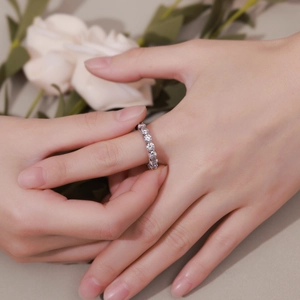 Sparkling S925 sterling silver eternity ring with single row of round moissanite stones