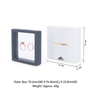 Detail view of 92x94mm gray suspension jewelry box for rings with clear film and white box