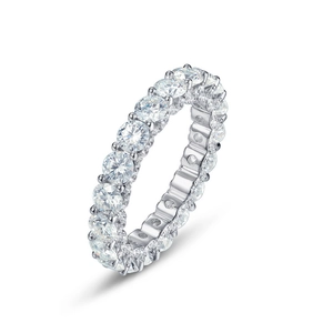S925 silver eternity ring with row of sparkling moissanite stones in a claw setting