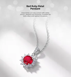 Macro detail of sun flower ruby pendant necklace with white cubic zirconia accents