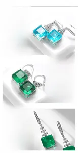 Details von smaragdgrünen und aquamarinblauen Ohrhängern aus S925 Silber mit Diamanten