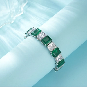 S925 silver bracelet with emerald cut green gemstones and white cubic zirconia accents