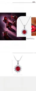 Detail view of S925 silver sunflower pendant with round faceted ruby and white zircons