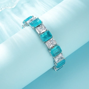 Luxurious S925 silver bracelet with alternating blue and clear rectangular cubic zirconia