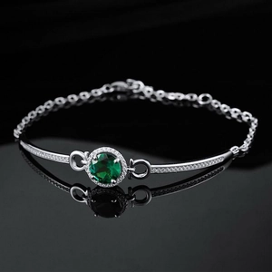 Lujosa pulsera de plata S925 con gema verde esmeralda y detalles de diamantes