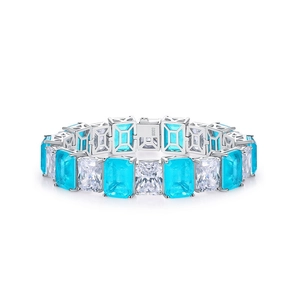 S925 sterling silver bracelet with emerald-cut blue and white gemstones on white background