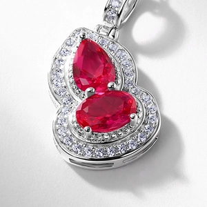 Elegant silver S925 gourd necklace with red gemstones and sparkling white diamond pavé