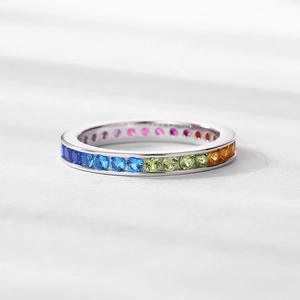 Elegant S925 sterling silver ring featuring a continuous row of rainbow cubic zirconia