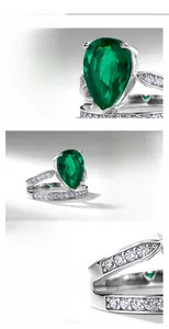 Macro detail of pear-cut emerald ring in S925 sterling silver with sparkling side stones