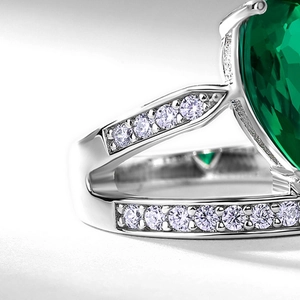 Vintage crown S925 silver ring featuring a pear-cut emerald and micro-pave diamonds