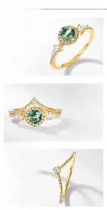 Detail of S925 silver green moss agate ring set with gold plating and zircons