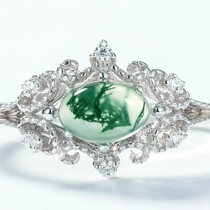 Vintage S925 silver ring featuring an oval moss agate stone with intricate filigree details