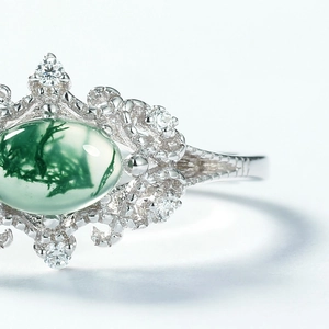 Vintage S925 silver ring featuring oval green moss agate and zircon accents in a retro style