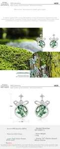 Macro detail of S925 silver bow earrings with green moss agate and zircon measurements