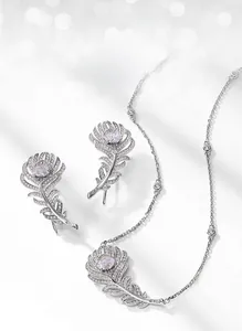 Detailed view of S925 silver feather jewelry set featuring ice-cut carbon diamonds