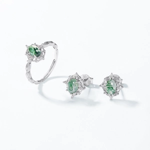 Elegant S925 silver set with moss agate stones featuring oval rings and stud earrings