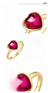 Detail showing red heart ruby ring in S925 silver with gold plating and sparkling stones