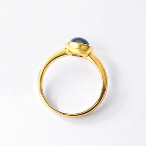 Minimalist S925 silver ring with blue cabochon gemstone and 10K gold plated finish