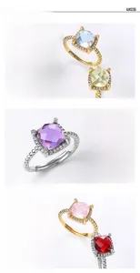 Detailed view of colorful square-cut gemstones set in S925 silver with diamond halo