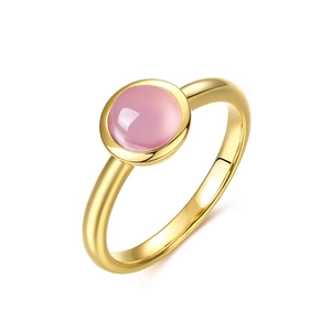 Minimalist S925 silver ring with round pink gemstone in gold plating, 45-degree angle view