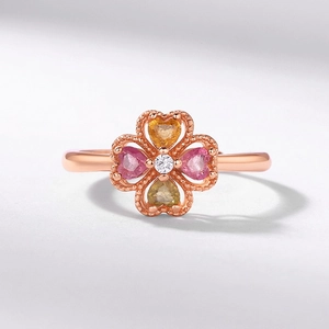 Luxury rose gold clover ring with heart-cut pink and yellow tourmaline gems