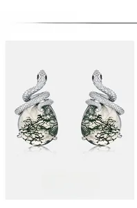 Close-up of S925 silver serpent earrings with green moss agate and snake scale texture