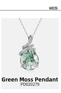 Detailed view of snake-shaped silver pendant with green moss agate drop and scale textures