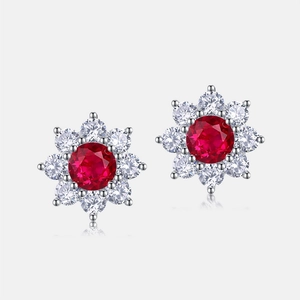 Flower-shaped S925 silver stud earrings with red ruby gemstone and white zircon accents
