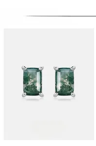 Macro shot of rectangular green moss agate earrings in a four-prong silver setting