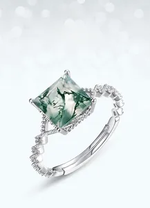 Macro detail of S925 silver ring featuring square green moss agate in 4-prong setting