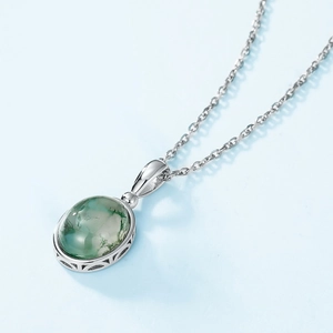 Oval strawberry quartz necklace with 925 silver setting and geometric filigree detail