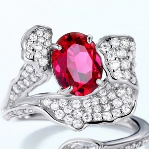 Macro shot of S925 silver ring featuring irregular red ruby and pavé diamond details