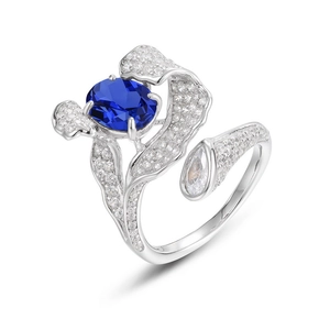 Close-up of S925 silver ring with large blue gemstone and micro-pave white zircons