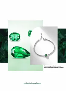 Macro detail of S925 silver bracelet featuring a lush green emerald and brilliant cubic zirconia