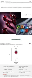 Close-up of S925 silver key pendant with 6.2mm ruby and moissanite detailing