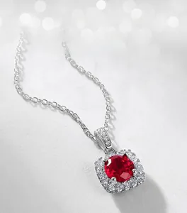 Macro view of S925 silver necklace featuring a square halo red lab-grown ruby pendant