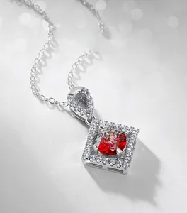 Close-up of S925 silver necklace with square ruby pendant and white zircon halo detail