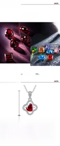 Macro shot of S925 silver four-leaf clover pendant with a lab-grown ruby and moissanite