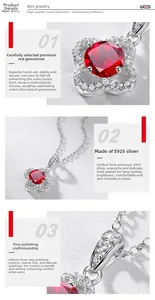 Macro detail of S925 silver four-leaf clover pendant with red ruby and pavé set diamonds