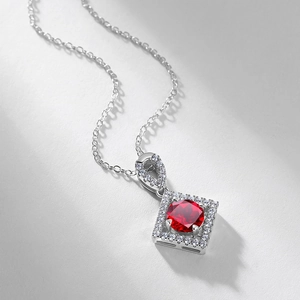 Luxury S925 silver necklace with square halo pendant and central red gemstone