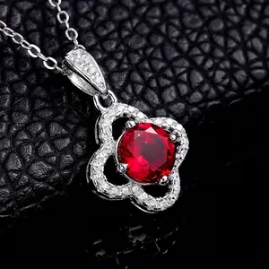 Red gemstone clover necklace in S925 sterling silver with sparkling pavé cubic zirconia